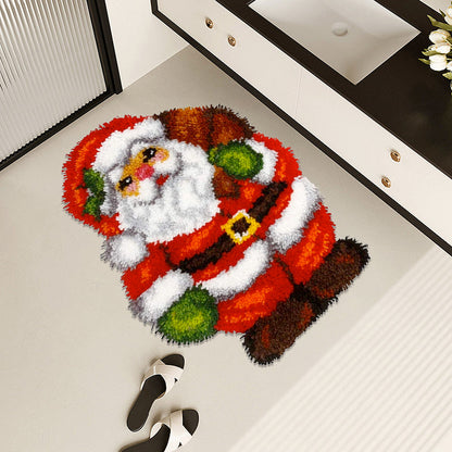 Noël | Kit de crochet pour tapis à loquet avec le Père Noël et ses cadeaux